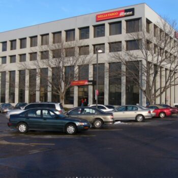 "Wells Fargo" sign and 5601 South Broadway building exterior